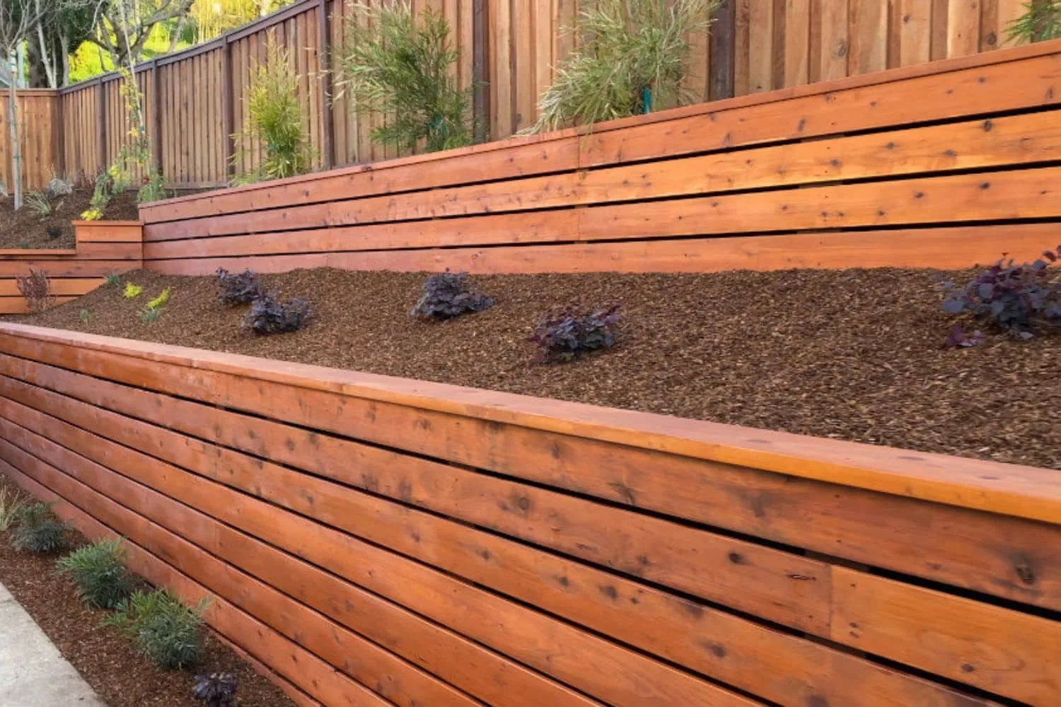 Timber retaining wall panels with galvanised steel posts